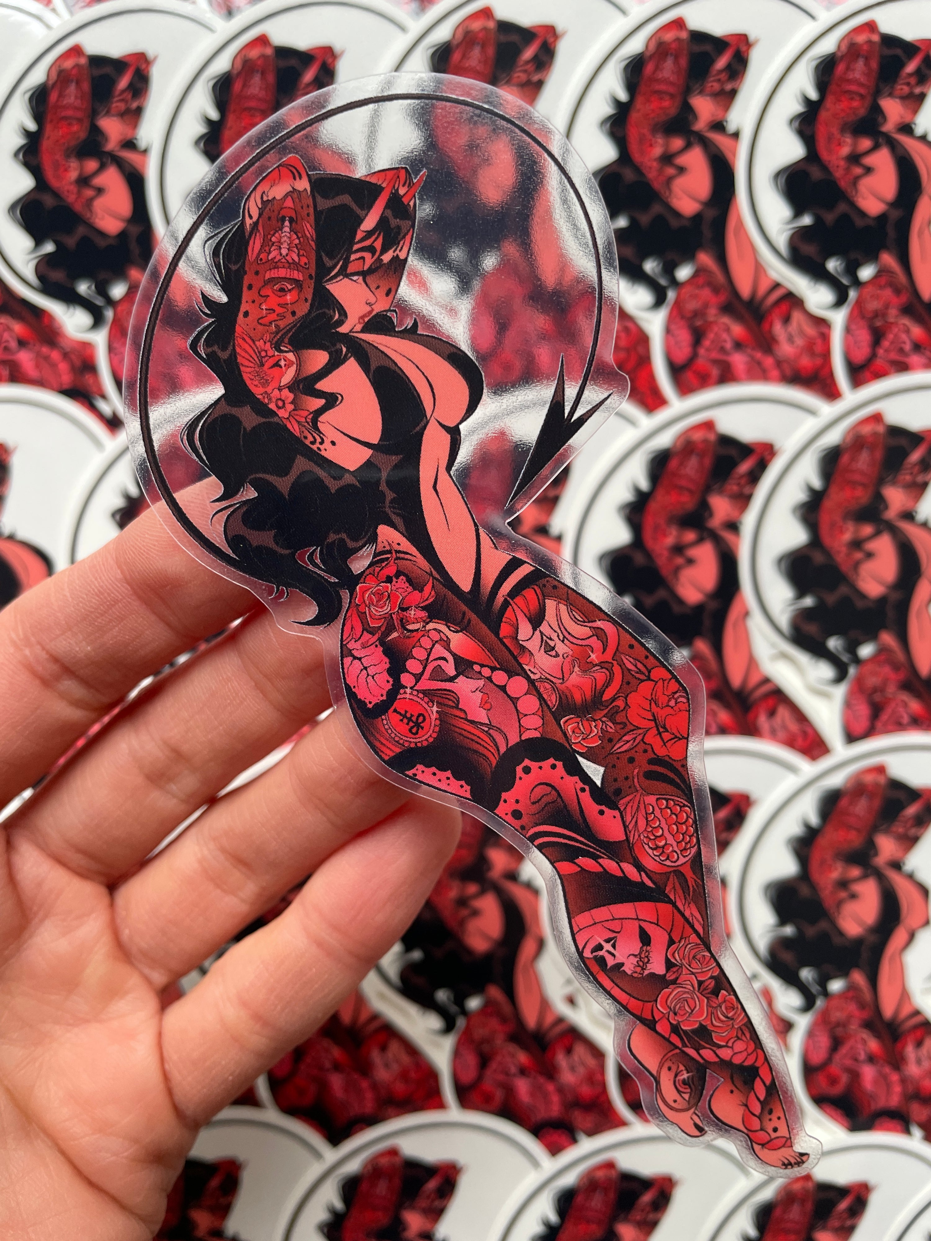 pink devil with neotraditional tattoos clear vinyl sticker by bloodknotcollective