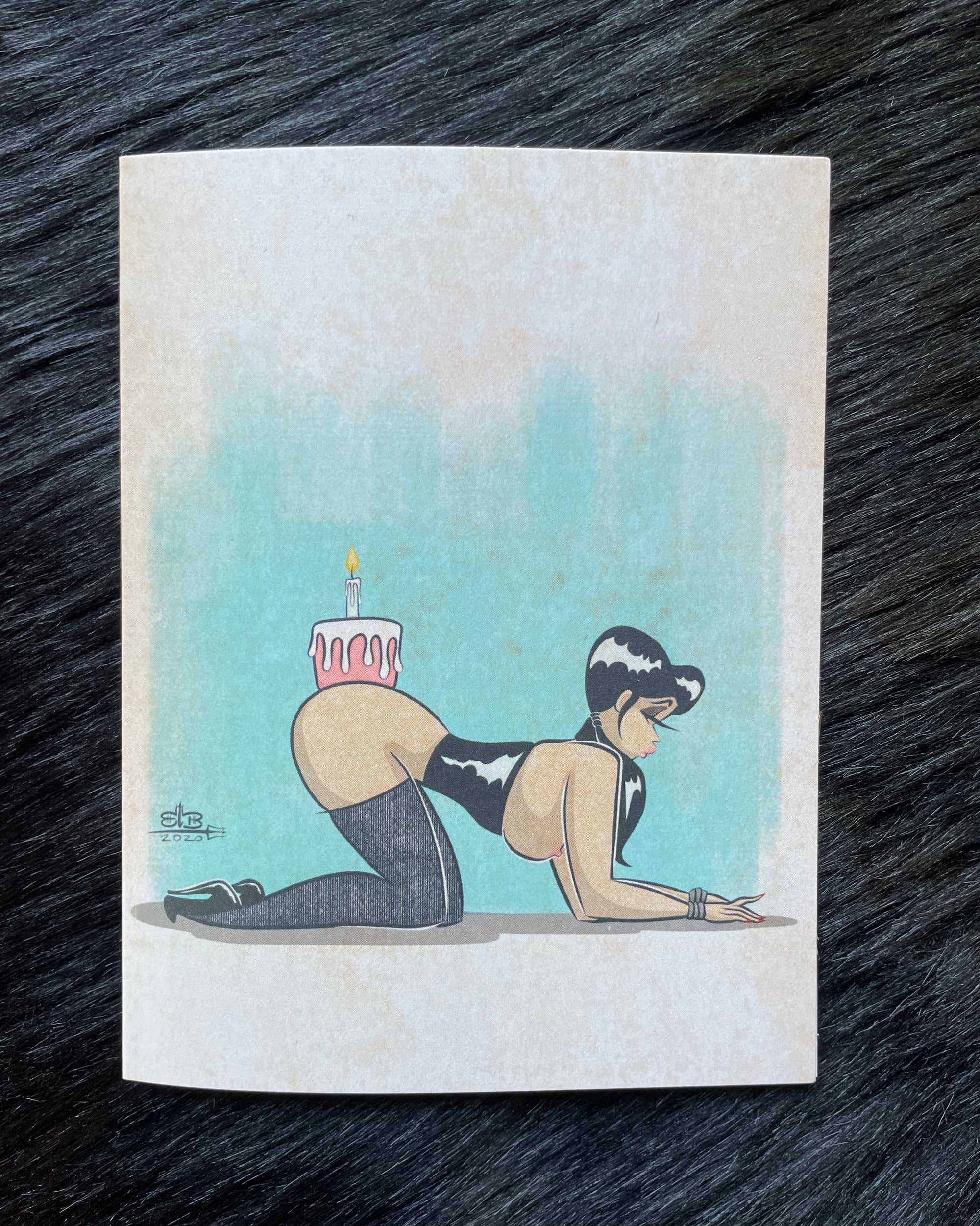 black birthday card of nude woman with cake on butt by bloodknotcollective