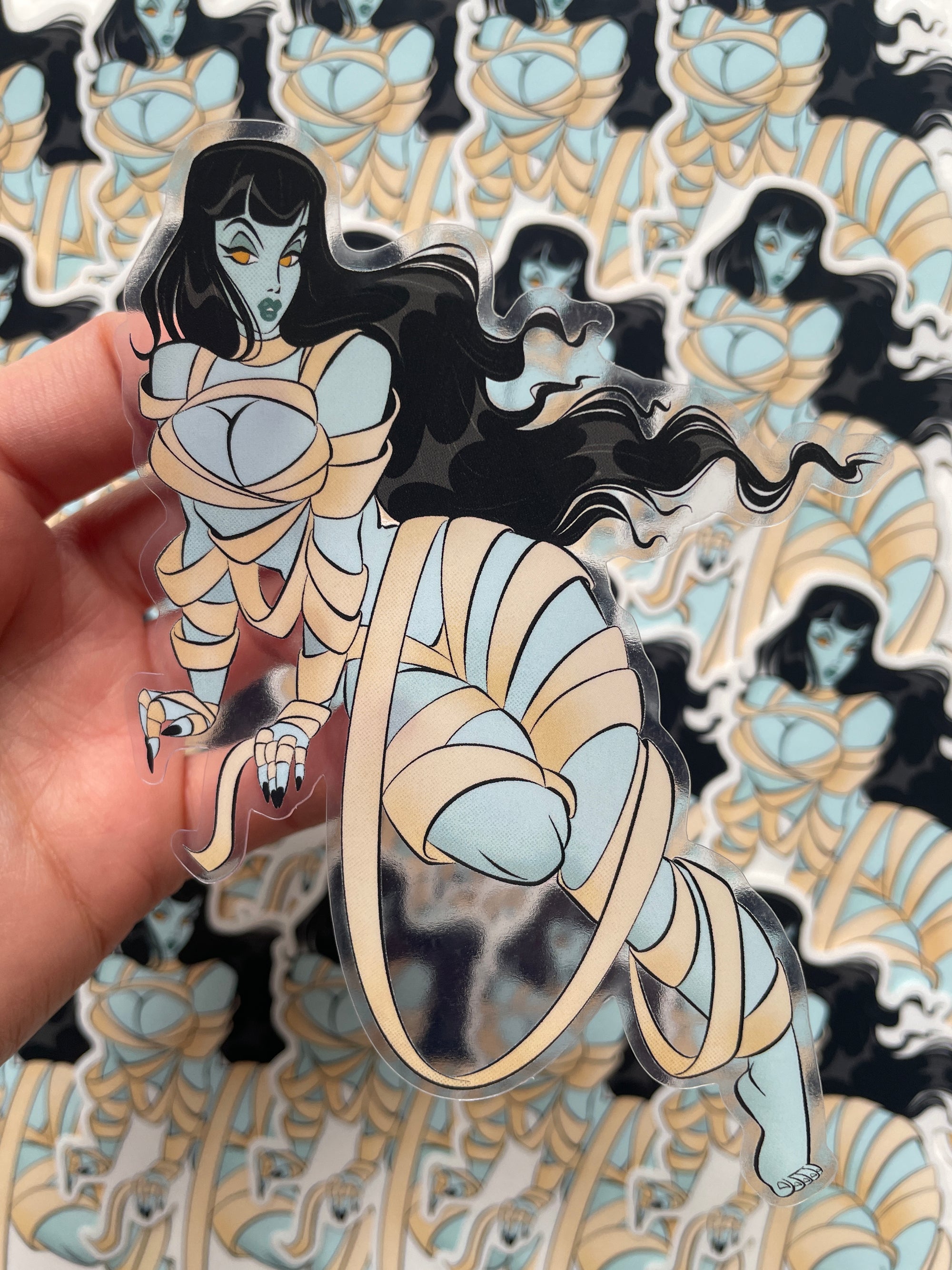 blue female mummy clear vinyl sticker by bloodknotcollective