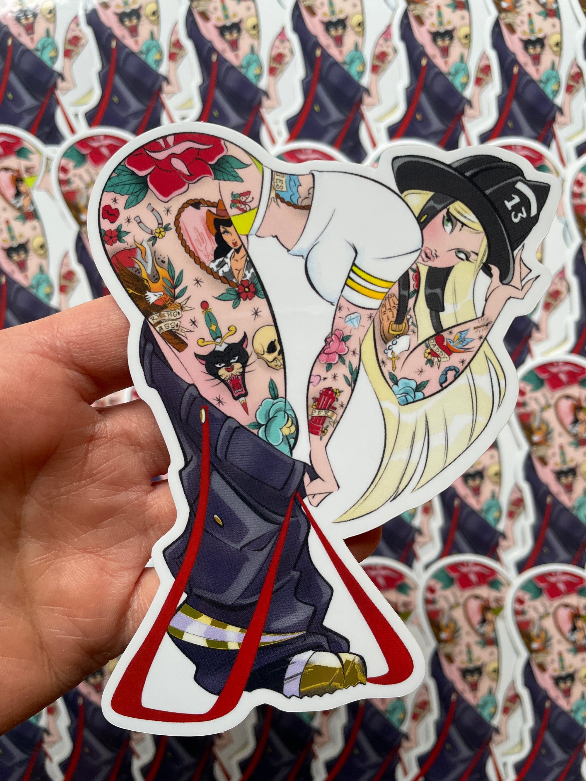 tattooed female firefighter pulling down pants holographic vinyl sticker by bloodknotcollective