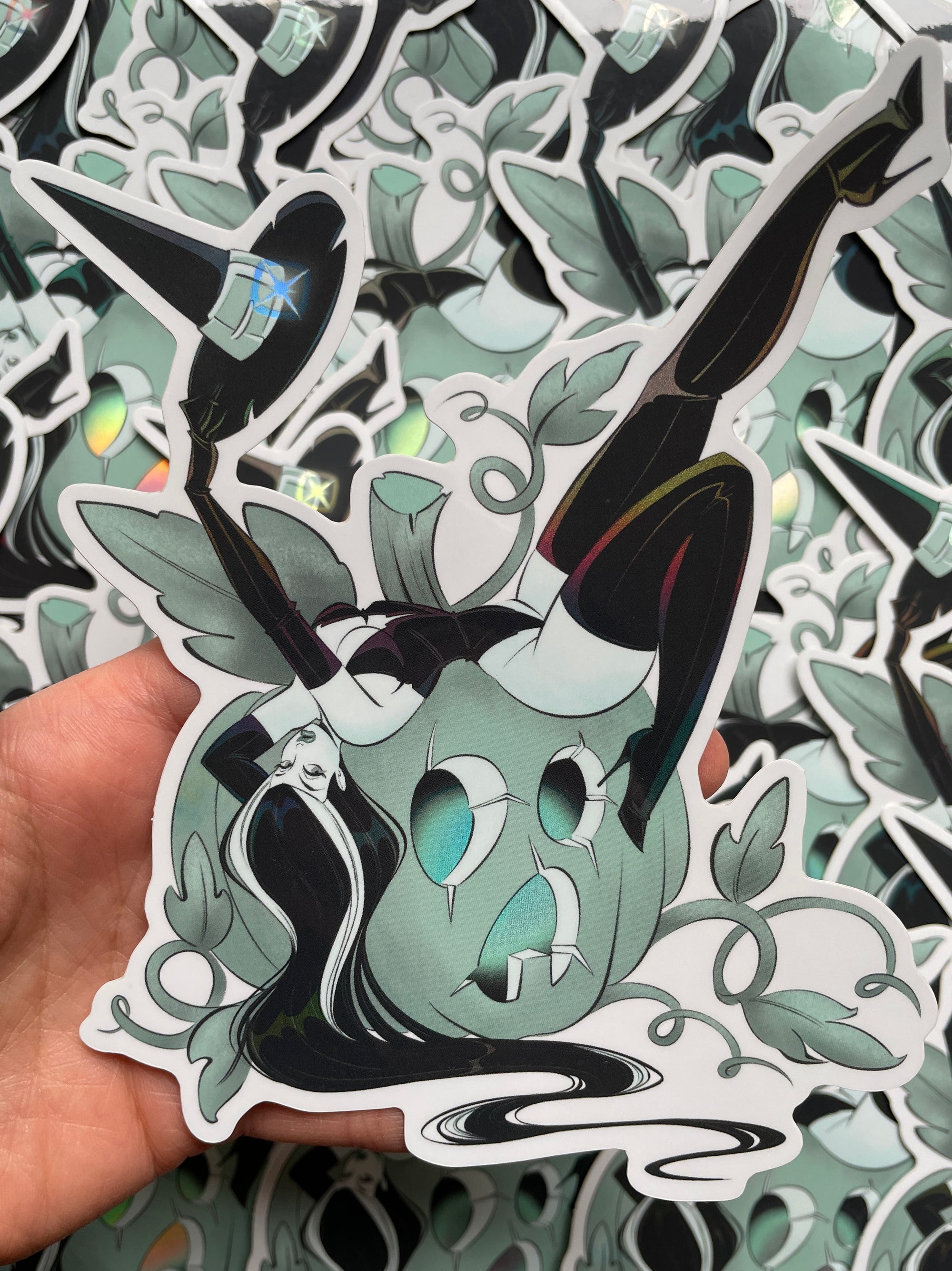 witch in latex leaning over pumpkin holographic jumbo vinyl sticker by bloodknotcollective
