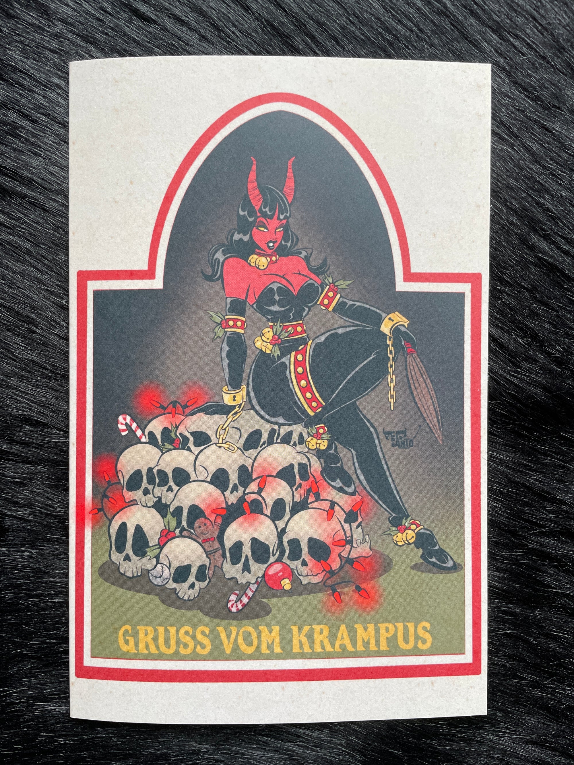 Krampus card of female krampus on skulls by bloodknotcollective