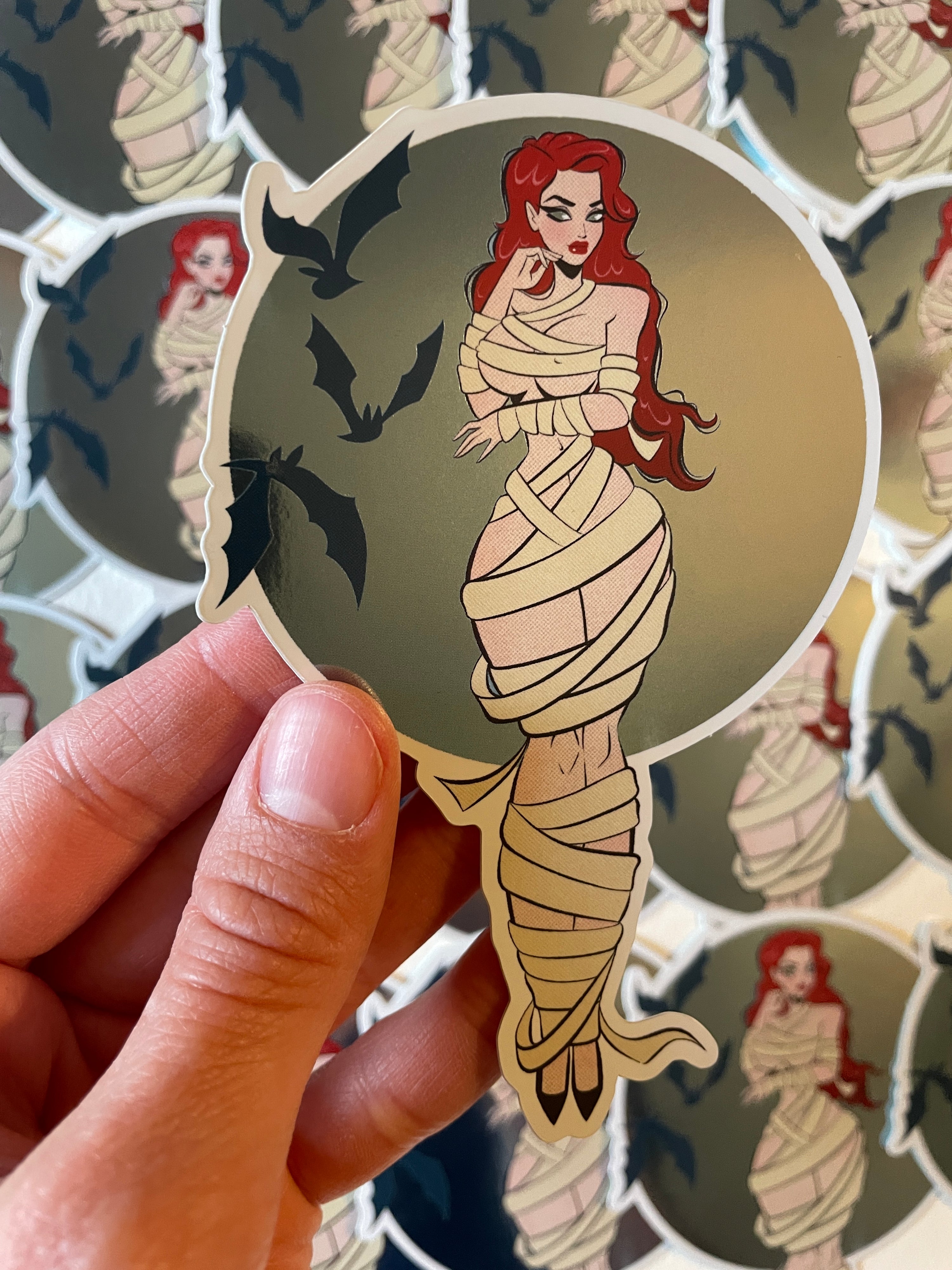 mummy with bats mirror sticker by bloodknotcollective