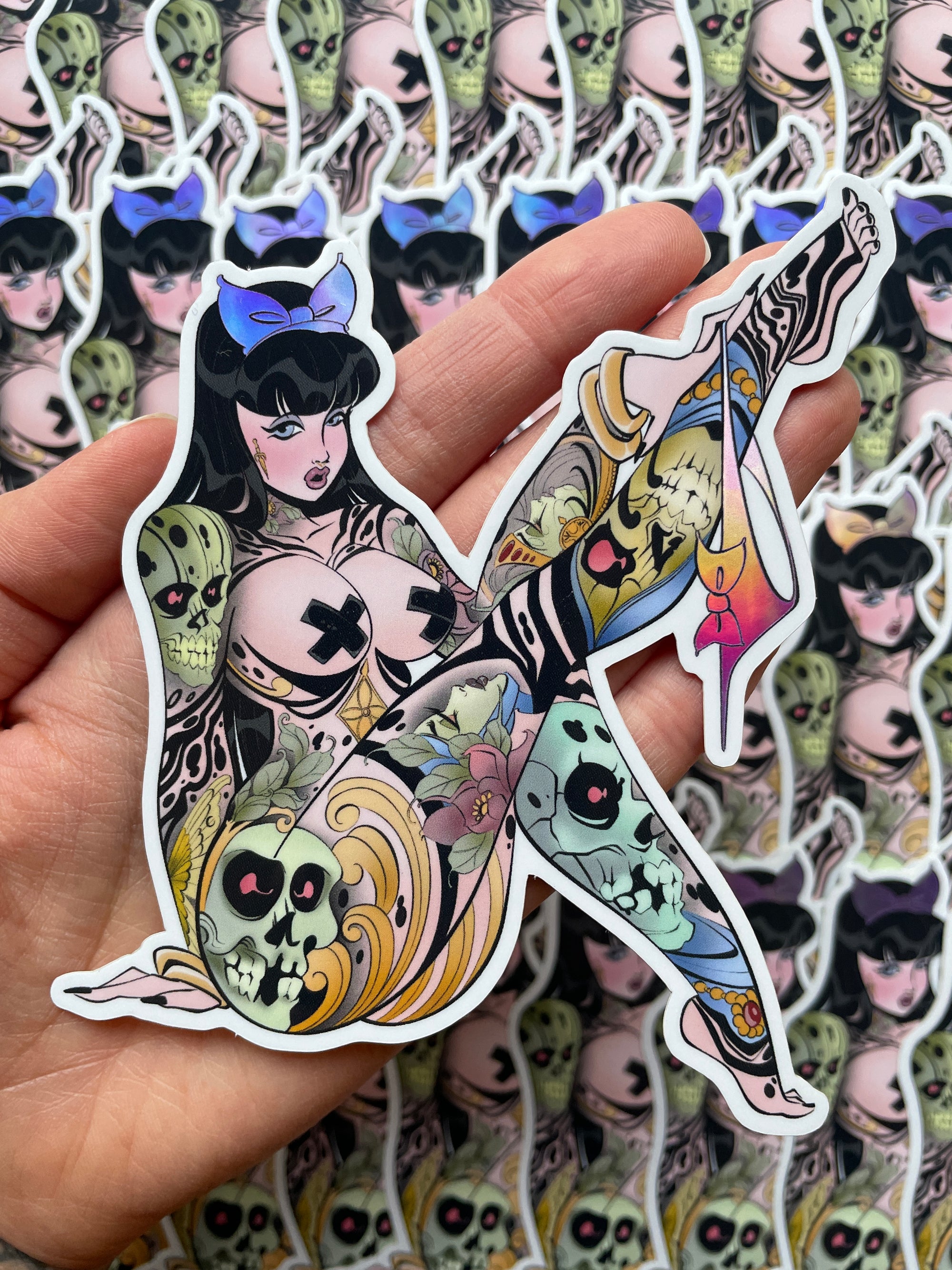 tattooed woman pulling off underwear holographic vinyl sticker by bloodknotcollective