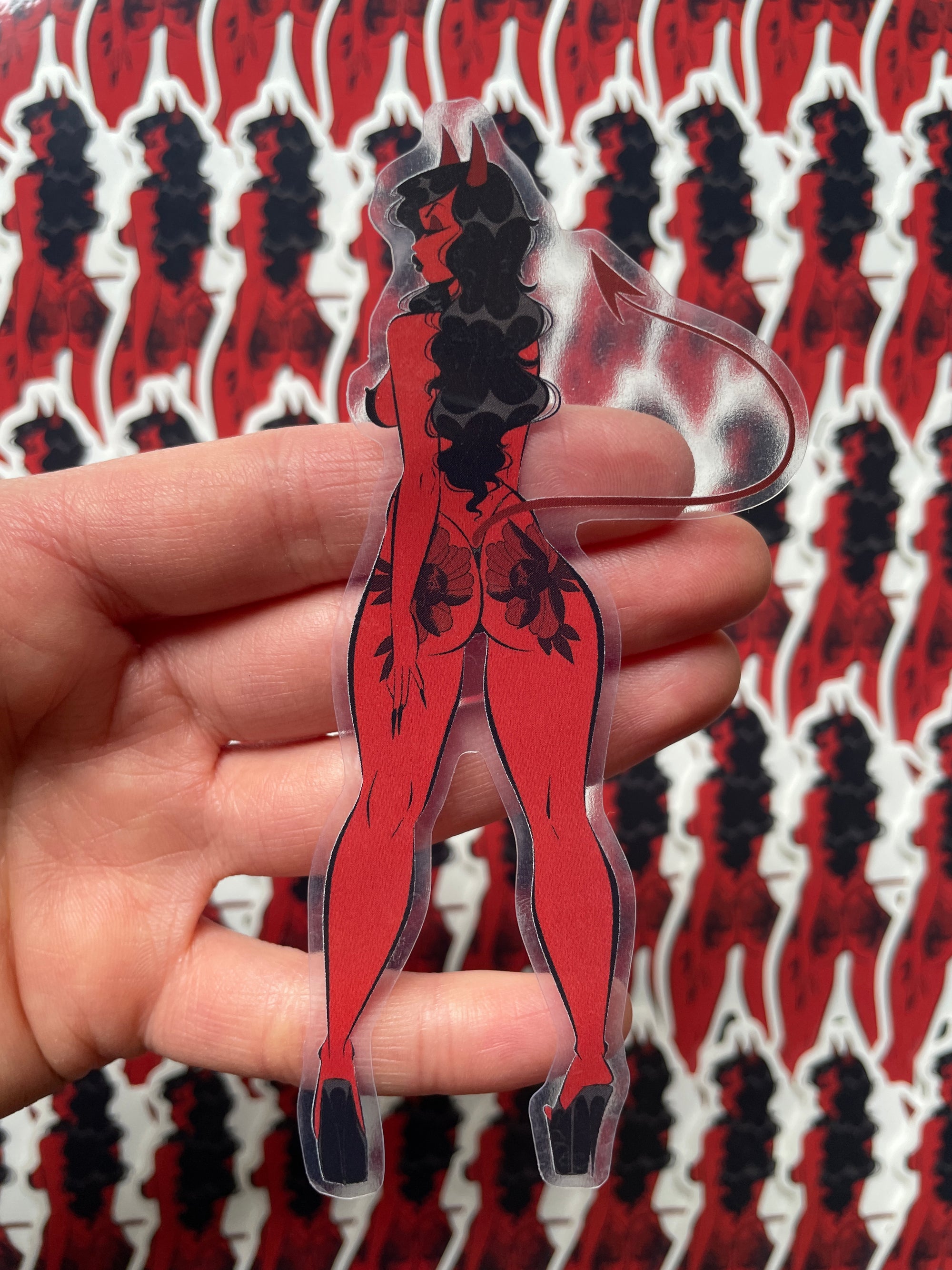 devil girl with peony tattoos clear vinyl sticker by bloodknotcollective