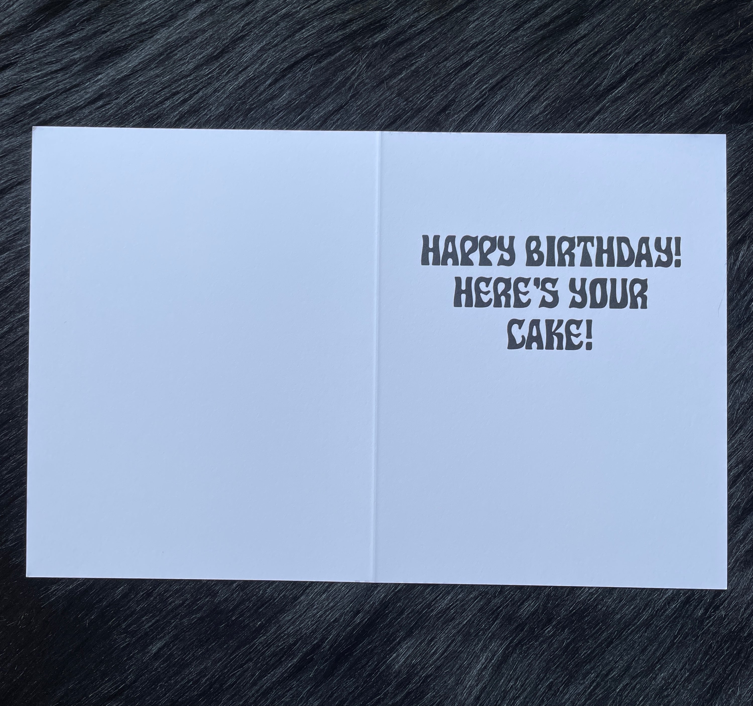 heres your cake inside of pink birthday card