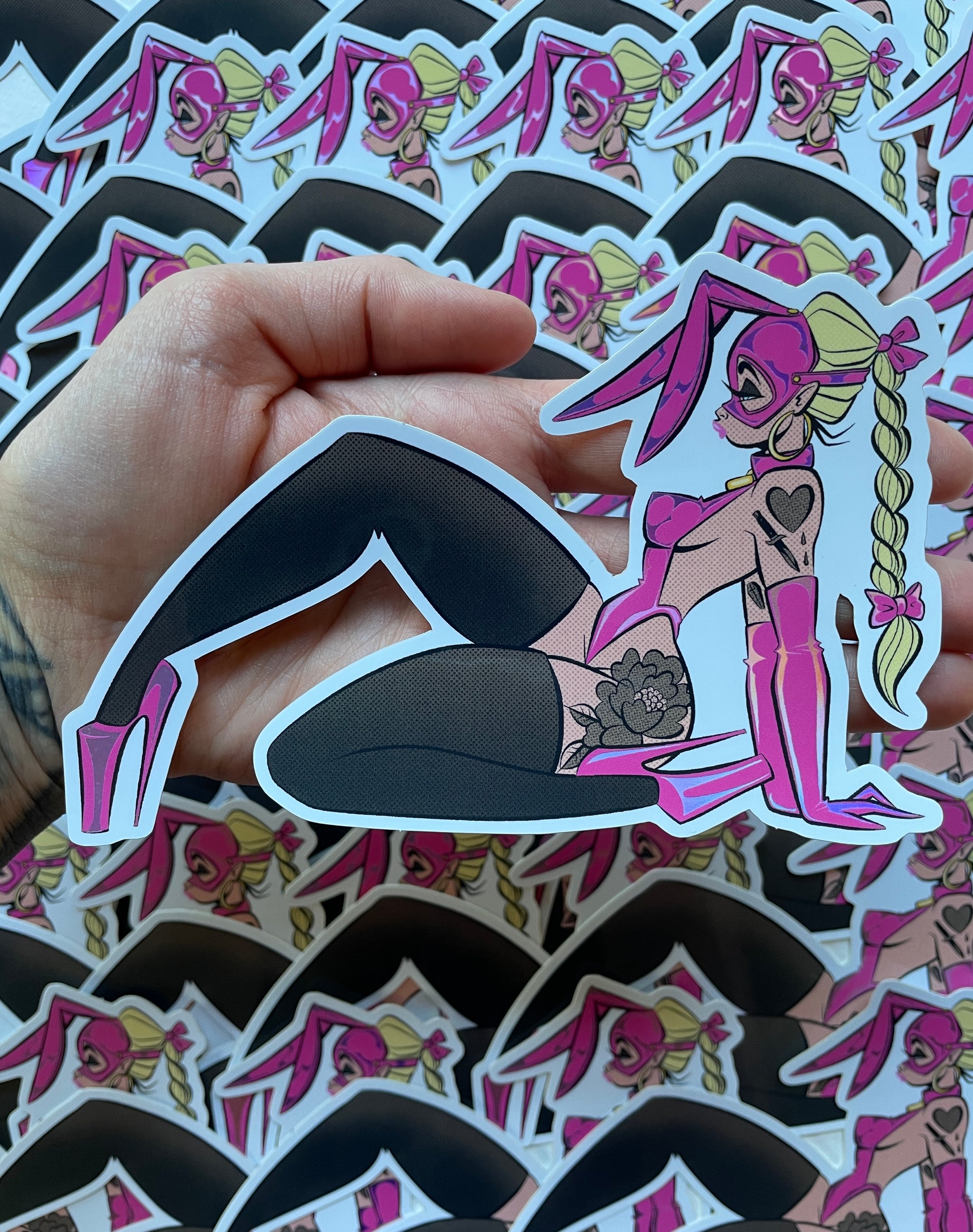 tattooed woman in pink latex bunny outfit holographic sticker by bloodknotcollective