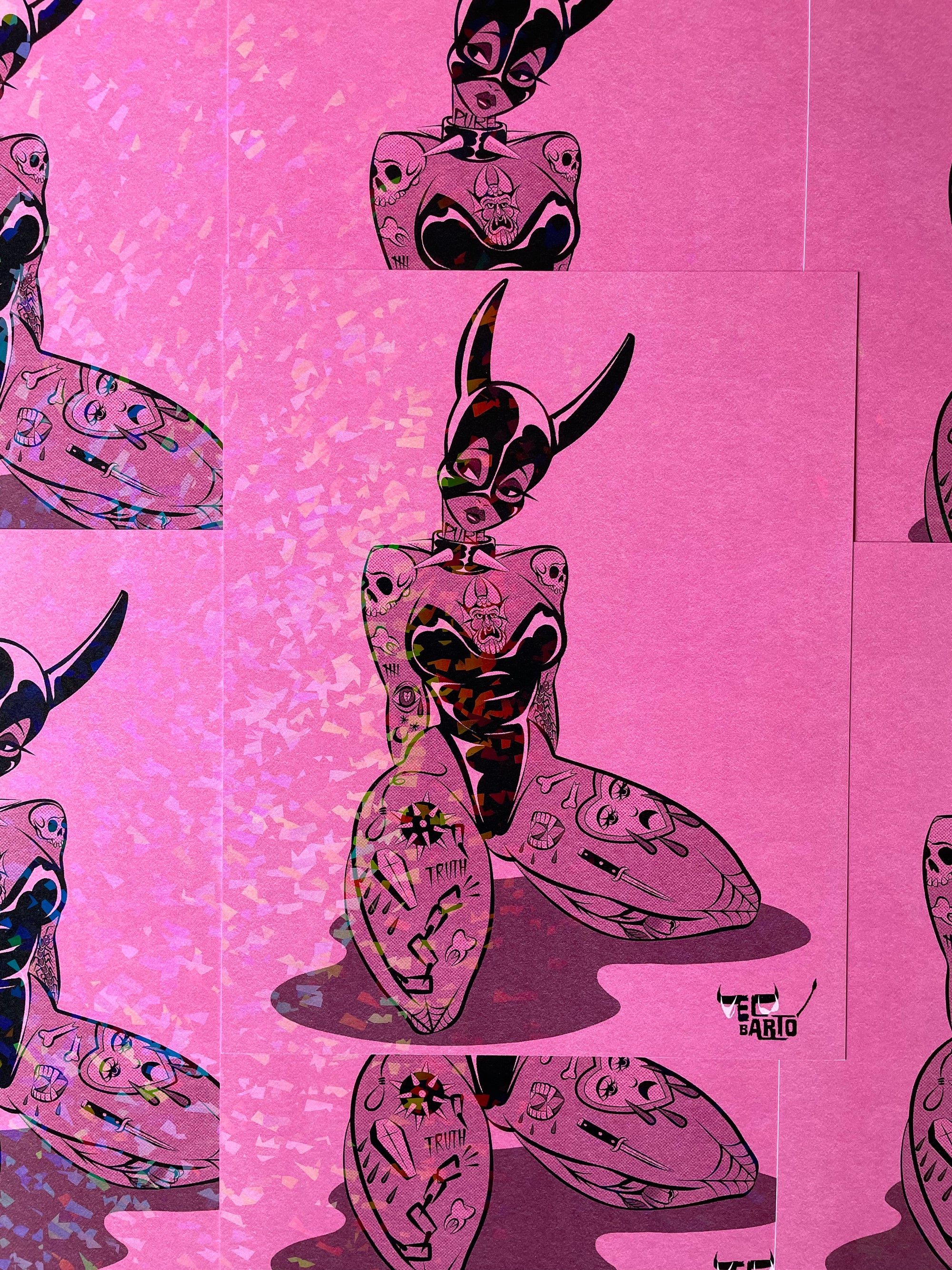 pink tattooed devil on holographic paper by bloodknotcollective