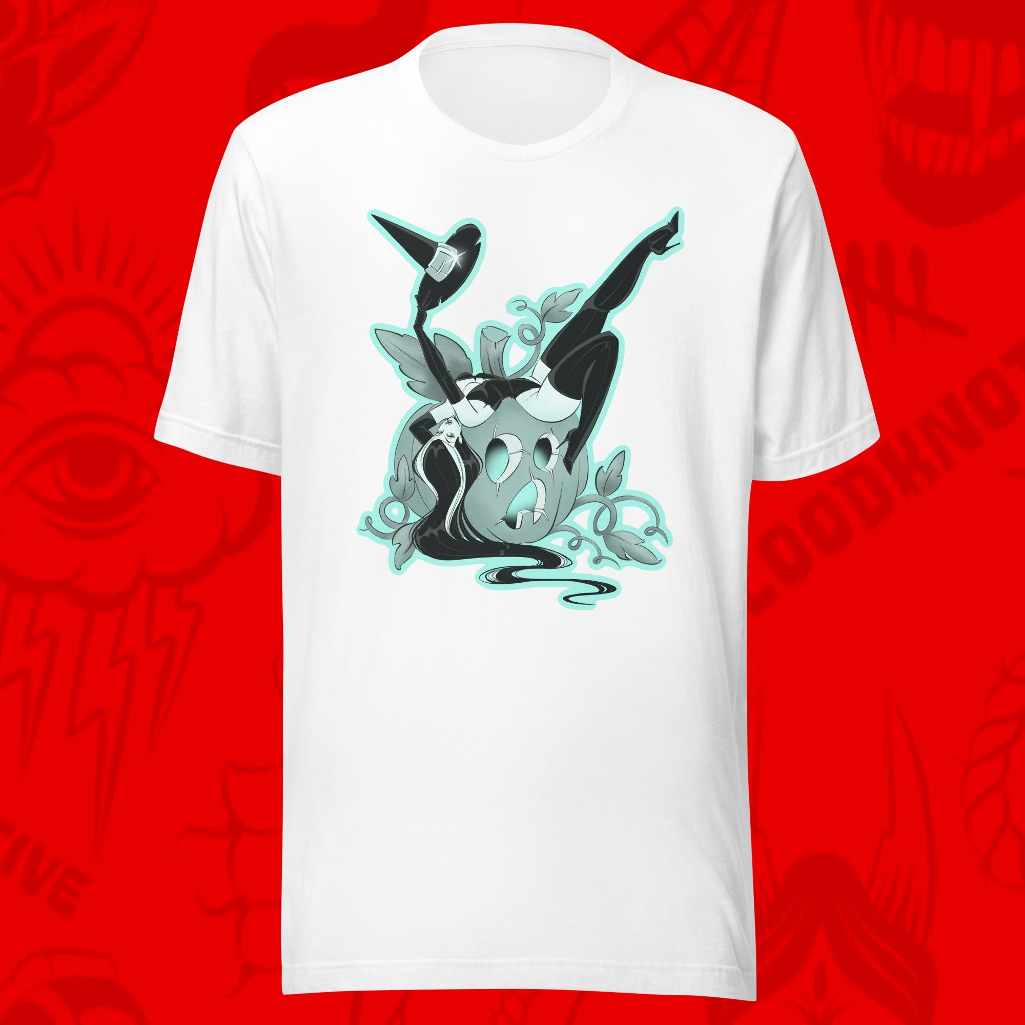season of the witch of woman leaning over pumpkin on white tee by bloodknotcollective
