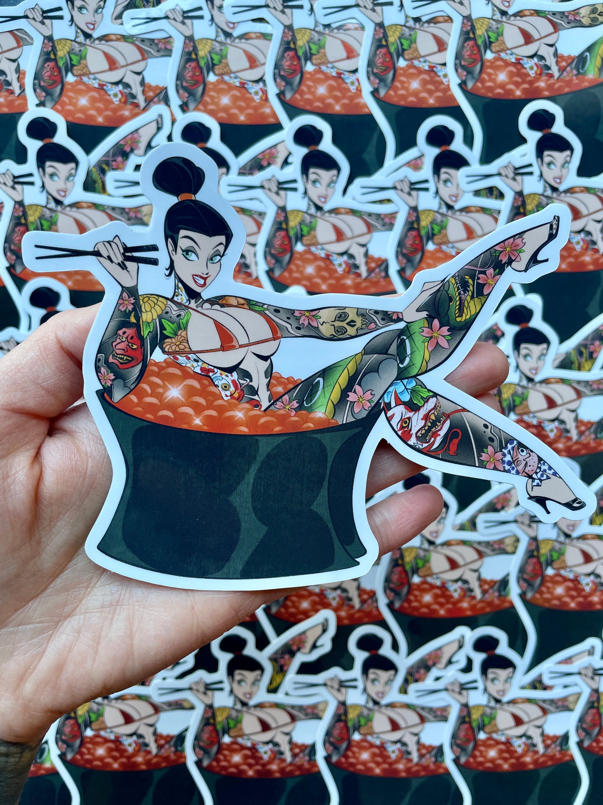 japanese tattooed pinup on tobiko sushi holographic vinyl jumbo sticker by bloodknotcollective